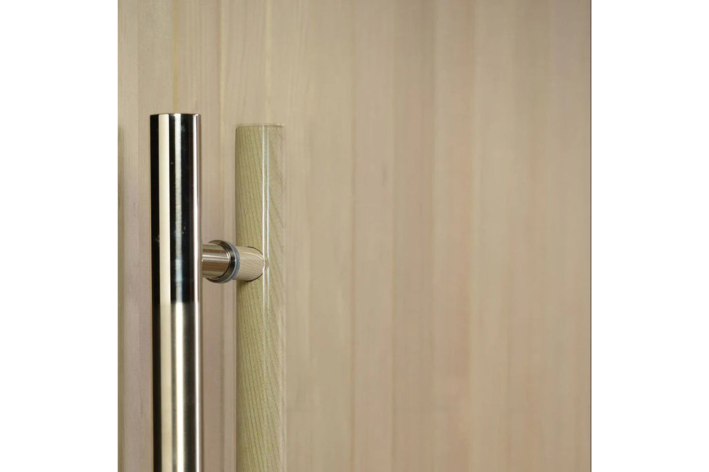 Stainless steel pull handle and light wood frame detail on sauna door against neutral wood background