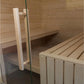 Almost Heaven Olympus 6-person sauna interior with light wood construction, glass door, wooden benches, and white handle on g