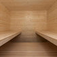 Almost Heaven Olympus 6-person sauna interior with light wood benches and walls, viewed from entrance