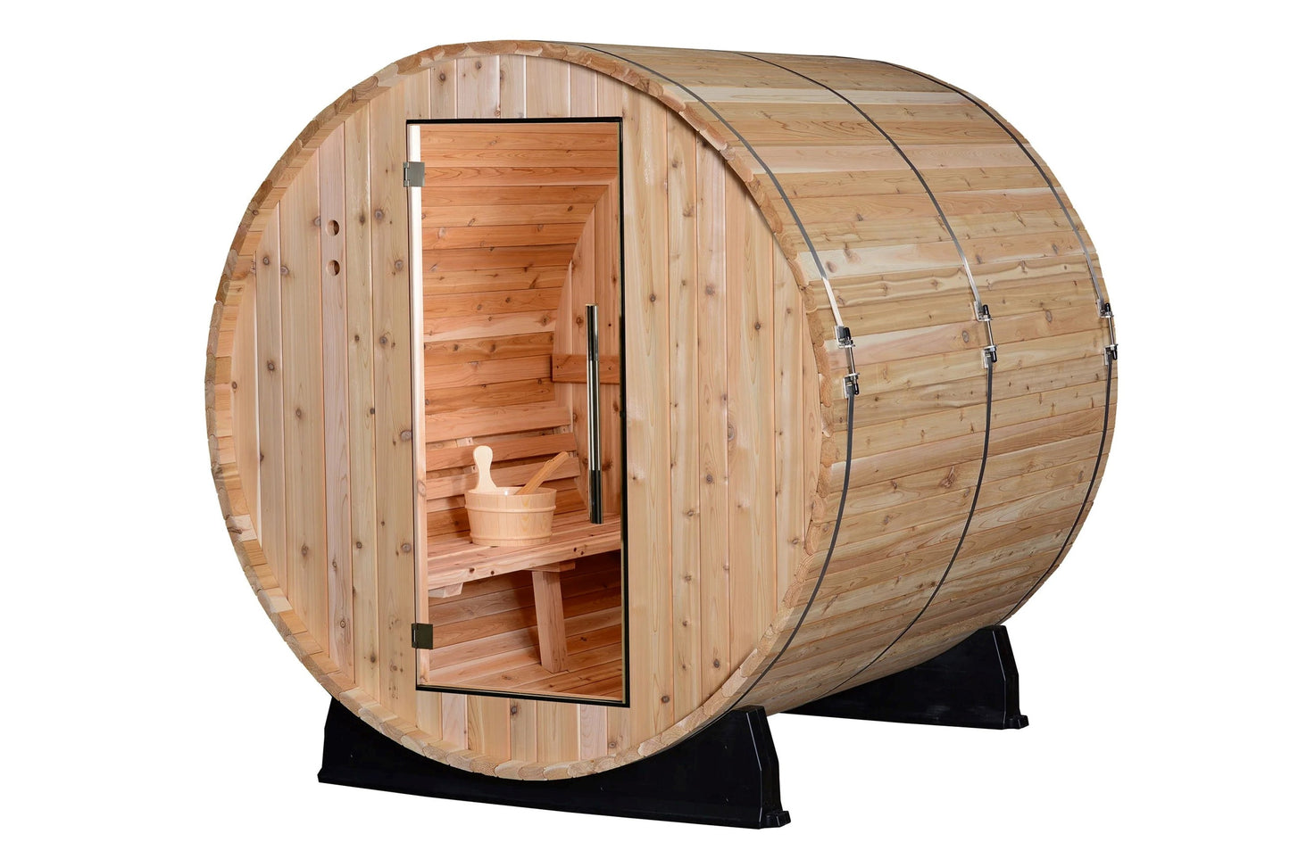 Barrel-shaped wooden sauna with cedar construction, open door revealing interior benches and wooden ladle, mounted on black s
