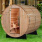 Almost Heaven Pinnacle 4-person barrel sauna with natural cedar wood construction, open door showing interior benches, on gra