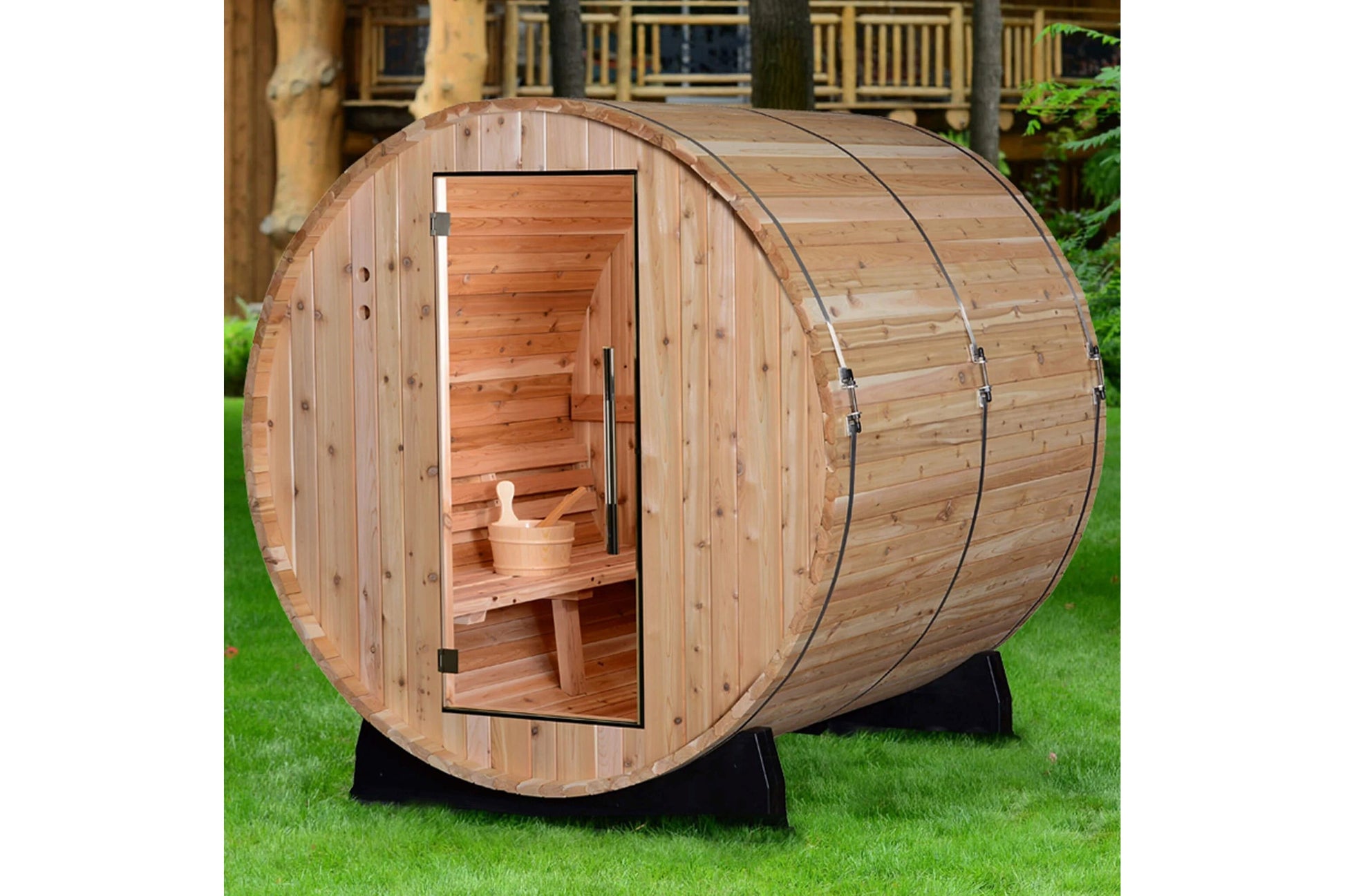 Almost Heaven Pinnacle 4-person barrel sauna with natural cedar wood construction, open door showing interior benches, on gra