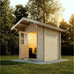 Almost Heaven Saddle Mountain outdoor sauna with light wood construction, open door showing illuminated interior, situated on