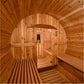 Almost Heaven Shenandoah barrel sauna interior showing natural wood construction with curved ceiling, wooden benches on both 