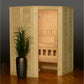 Natural wood corner sauna with light pine construction, glass door, interior benches, and decorative plant on wooden floor
