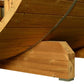 Wooden barrel sauna exterior showing curved cedar construction with metal support bands and light wood beam details on white 