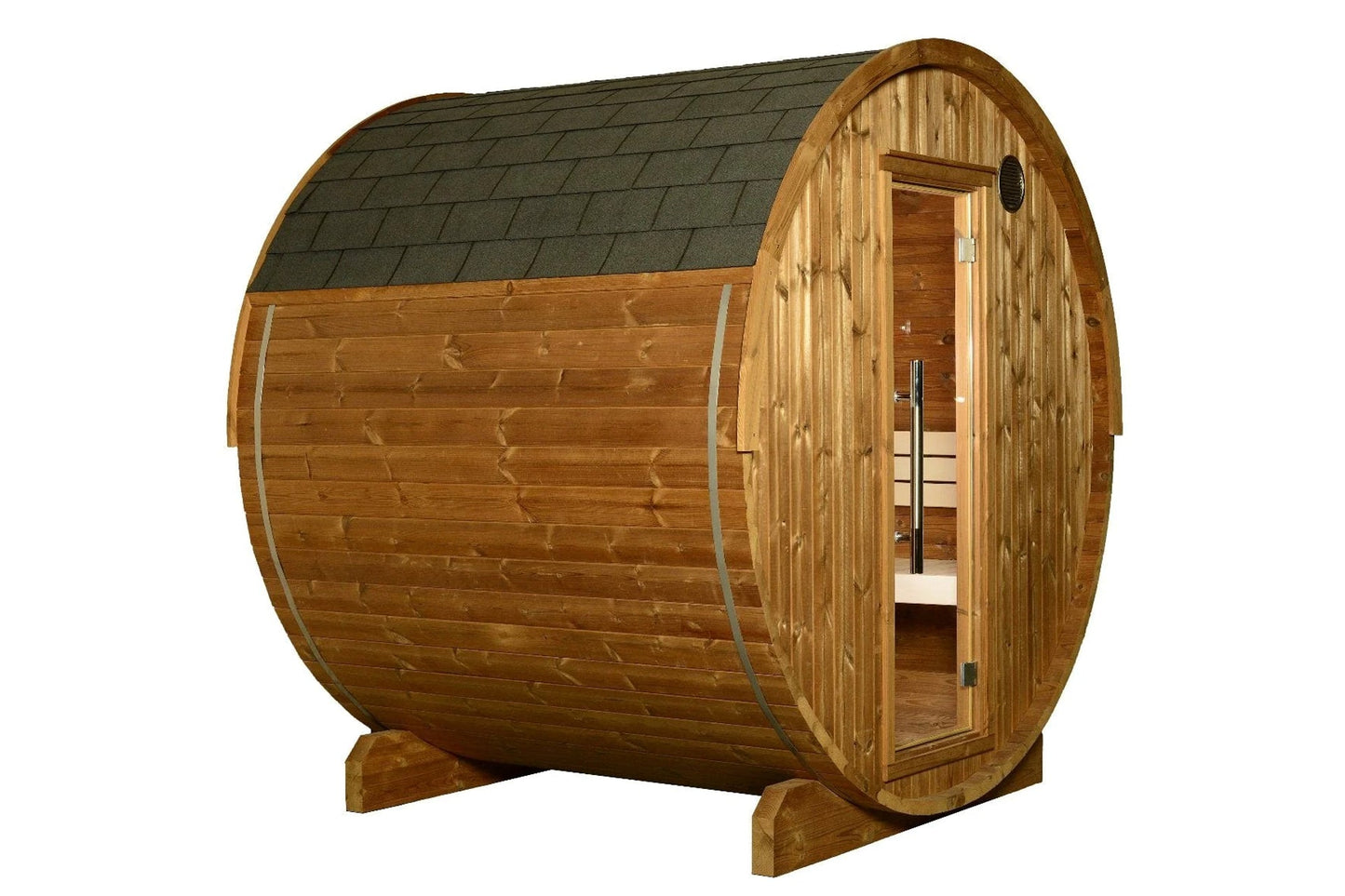 Wooden barrel sauna with arched roof, tan wood construction, dark shingled top, open door showing interior bench seating, on 
