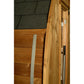 Almost Heaven Takoa barrel sauna with charcoal gray roof shingles, natural wood exterior, and open wooden door showing interi