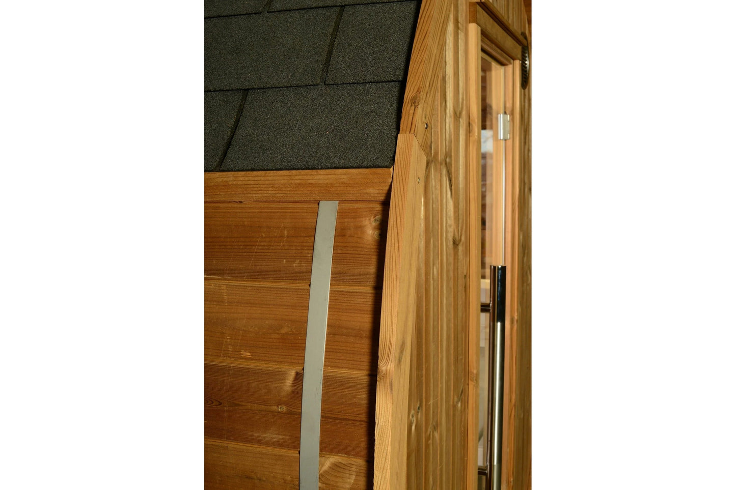 Almost Heaven Takoa barrel sauna with charcoal gray roof shingles, natural wood exterior, and open wooden door showing interi