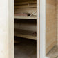 Almost Heaven Timberline sauna interior showing wooden benches and slatted walls, open door view
