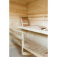 Interior view of wooden sauna with tiered bench seating, ladder, and light wood construction throughout