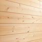Light natural wood shiplap paneling with knots, interior wall detail of sauna