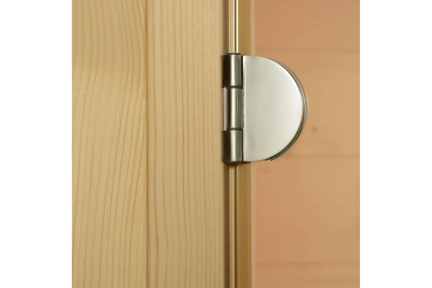Stainless steel hinge with round chrome handle mounted on light wood door panel
