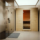 Almost Heaven Tyrol indoor sauna with light wood construction, glass shower enclosure, and cedar interior visible through ope
