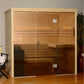 Cedar wood indoor sauna with glass door and metal handles, showing wooden benches inside, on wooden floor