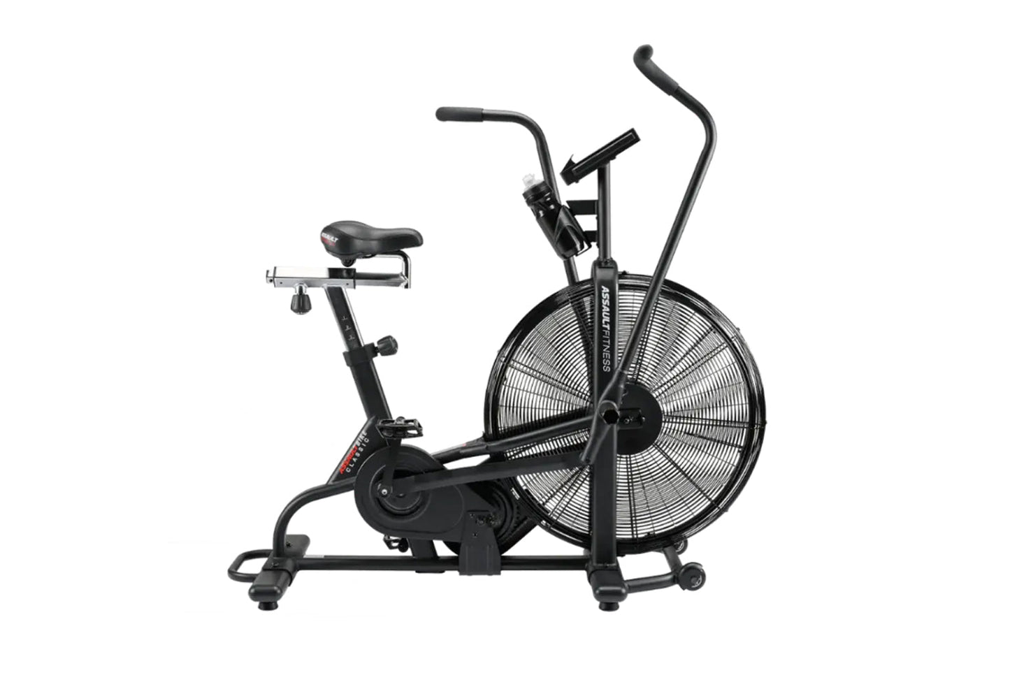 Black stationary air bike with large fan wheel, padded seat, dual handlebars, and resistance display on white background
