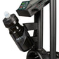 Black stationary exercise bike with digital console, water bottle holder, and dual control handles on white background
