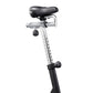 Stationary exercise bike with black padded seat, silver metal frame, black pedal post, and adjustment knob on white backgroun