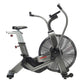 Assault Elite air bike with silver frame, black seat, dual handlebars, and large black fan wheel on white background