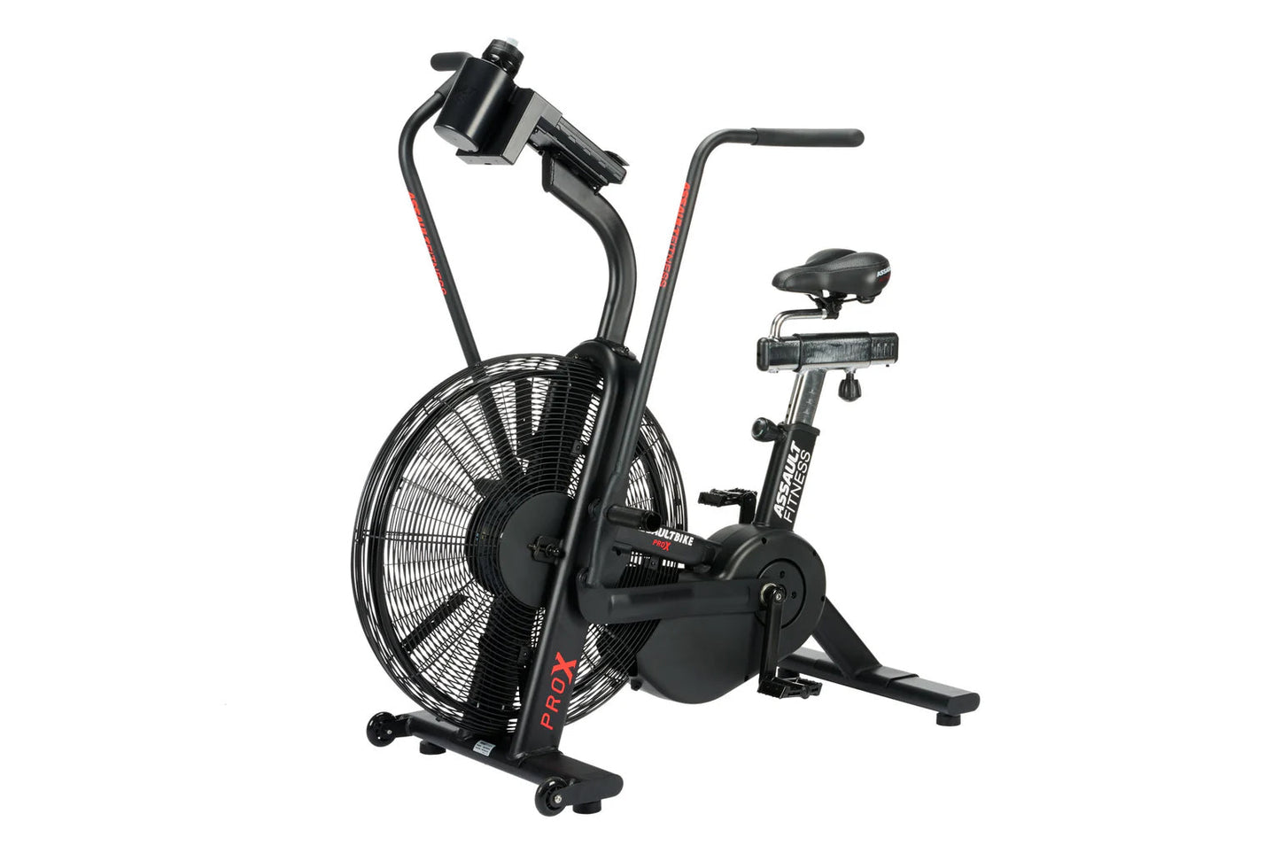Black air bike with large fan wheel, upright handlebars, and stationary seat on white background