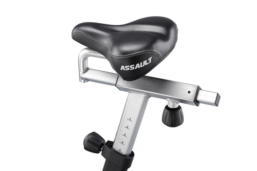 Assault AirBike stationary exercise bike seat and frame with silver post and black padded saddle on white background