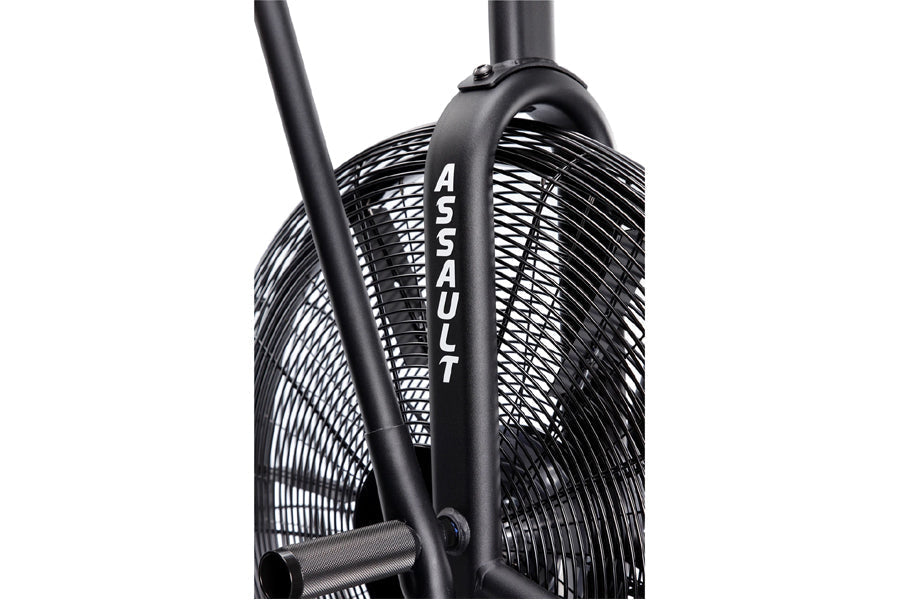 Black Assault AirBike with large fan cage and dual handles, displayed on white background