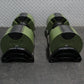 Pair of green and black NÜOBELL adjustable dumbbells, 80lb, on gym floor mat, front view