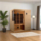 Golden Designs Bilbao 3-person infrared sauna with natural wood exterior and glass door in home setting