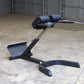 Body-Solid 45-degree ab and back hyperextension bench with black frame, padded backrest, and leg extension on concrete floor