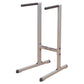Body-Solid dip station with silver metal frame, black rubber handles, and wide base on white background
