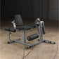 Body-Solid leg extension and curl machine with gray steel frame, black padded seat and leg pads, adjustable weight plate sele