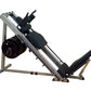 Body-Solid leg press and hack squat machine with silver frame, black foot platform, seat, and weight plate storage on white b