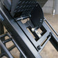 Close-up of black Body-Solid leg press machine showing foot pedal, adjustment lever, and metal frame details