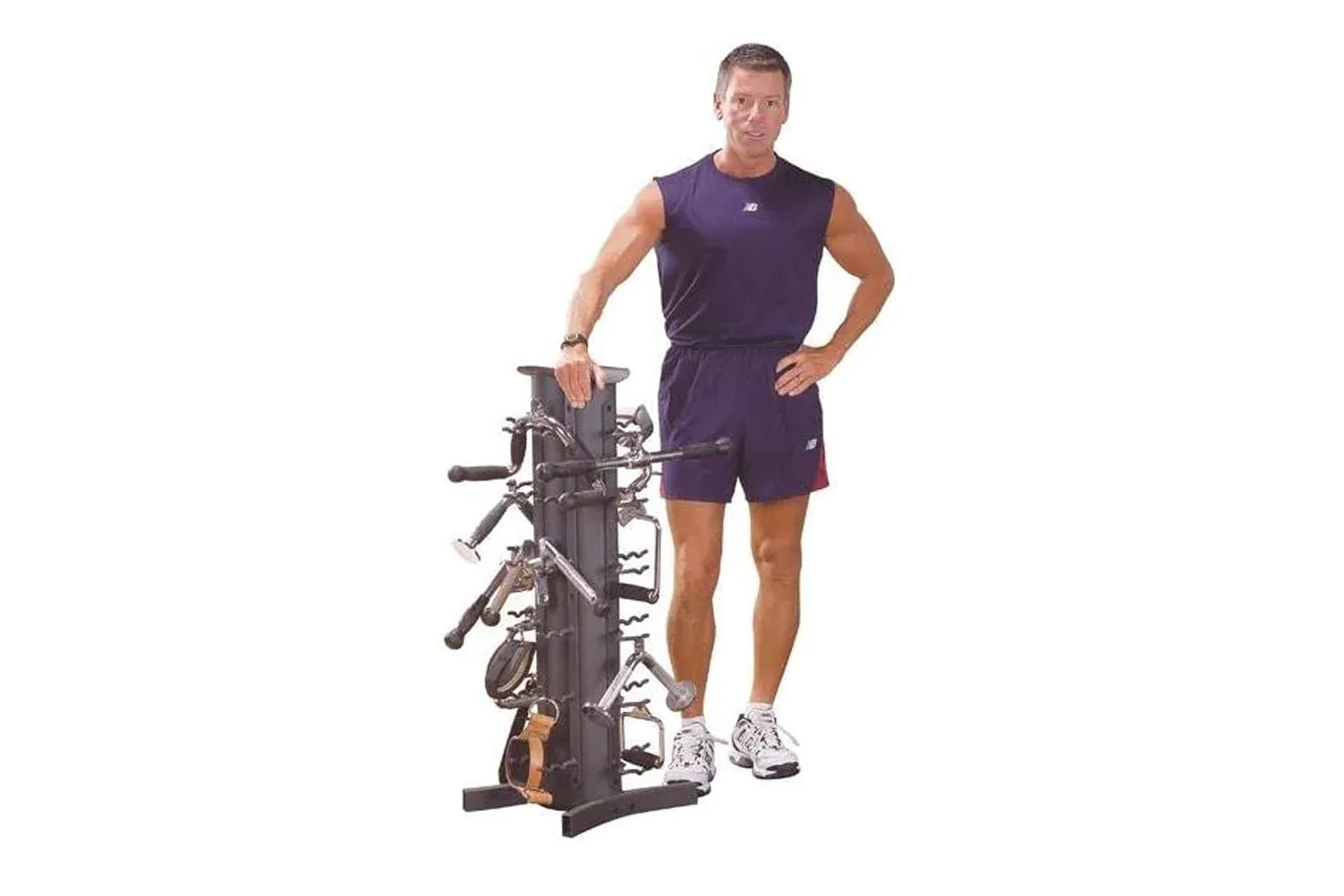 Man wearing navy sleeveless athletic tank top and shorts standing next to black vertical bike storage rack on white backgroun