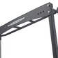 Black steel BodyCraft Jones Freedom Smith Machine with adjustable arms and weight pegs on white background