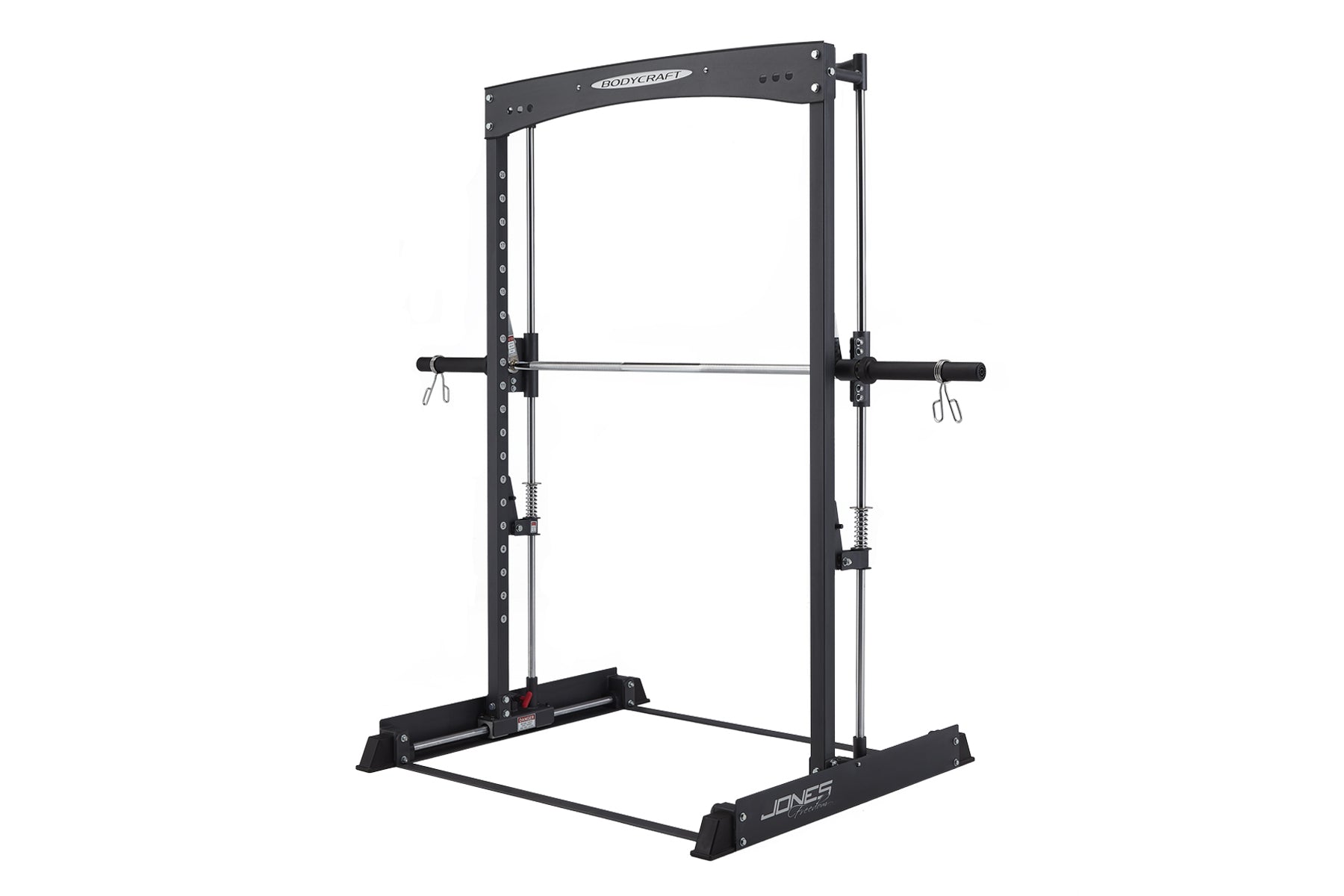 Black steel Smith machine with adjustable barbell, safety catches, and cable attachments on white background