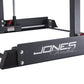 Black Jones Freedom Smith Machine with metal frame and safety bars on white background