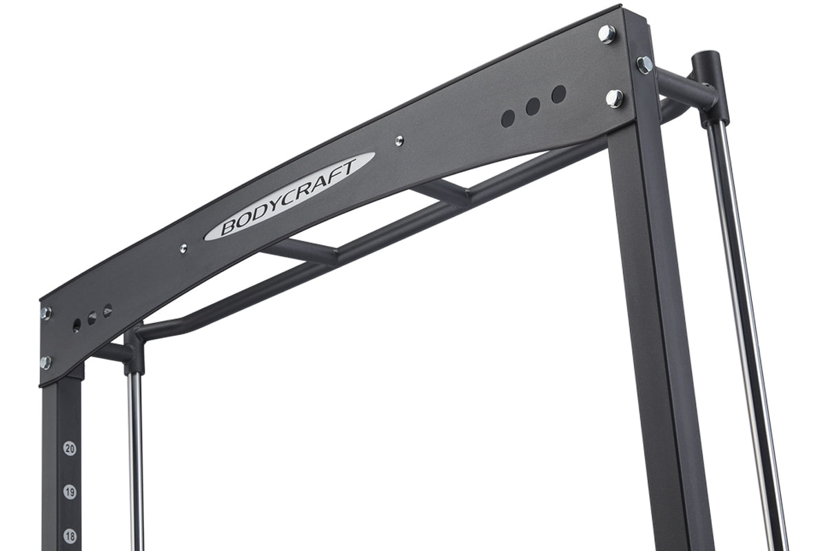 Black BodyCraft Jones Freedom Smith Machine with metal frame and weight markers on upright post, on white background