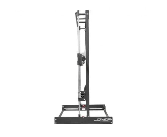 Black and silver vertical Smith machine with dual guide rails, adjustable safety catches, and wide base stand on white backgr