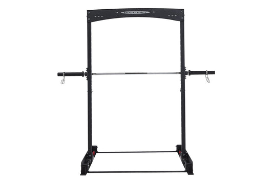 Black BodyCraft squat rack with barbell, adjustable bar positions, and safety catches on white background