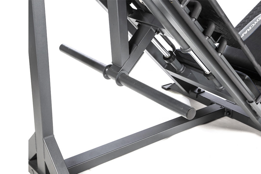 BodyCraft Pro Leg Press Hack Squat machine with gray metal frame and black foot pedals on white background