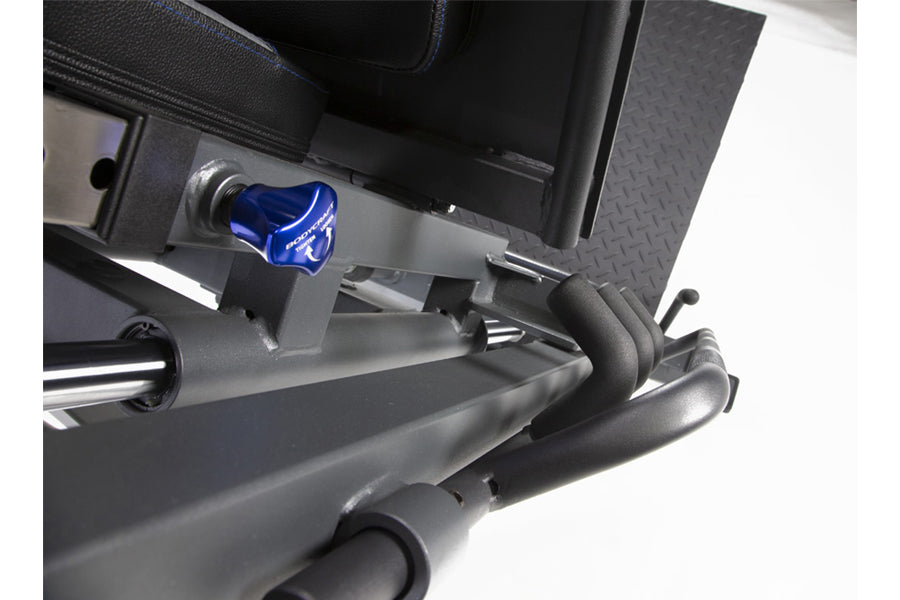 BodyCraft Pro Leg Press Hack Squat F760 with blue adjustment knob and gray metal frame, overhead view