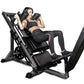 Woman using black BodyCraft Pro Leg Press machine with extended leg platform, holding upper handles during exercise demonstra