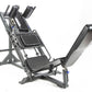 Black and gray BodyCraft Pro leg press and hack squat machine with padded seat, footplate, and adjustable handles on white ba