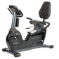 BodyCraft R200 semi-recumbent exercise bike with black seat, gray frame, digital console, and foot pedals on white background