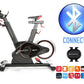 Black and gray BodyCraft SPR stationary exercise bike with red accents, adjustable seat and handlebars, shown with Bluetooth 