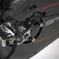 SPT-Mag magnetic pedals with black straps and chrome cage on indoor cycle, close-up detail view