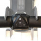 Black digital console with triangular control buttons mounted on rowing machine handle bar with gray mesh backrest visible