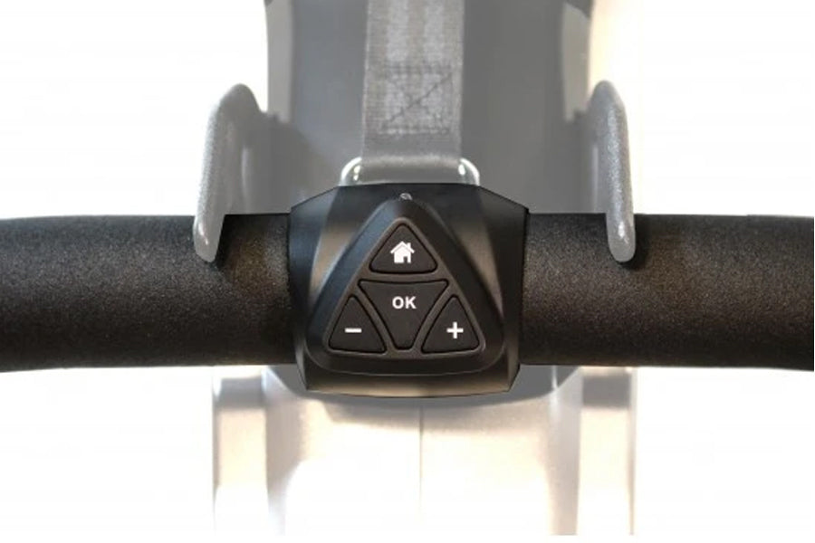 Black digital console with triangular control buttons mounted on rowing machine handle bar with gray mesh backrest visible