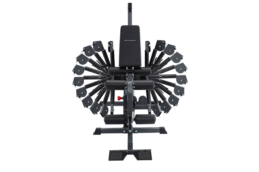 Black multi-station home gym with circular dumbbell weight selector arms radiating outward, digital display, and foot platfor